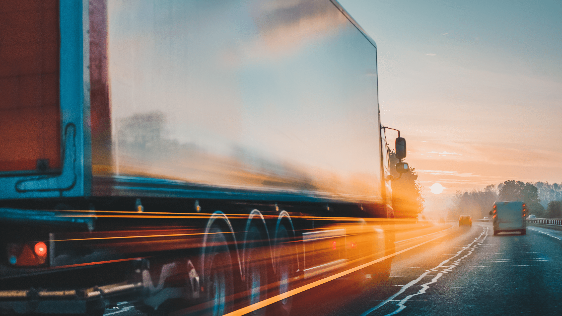 Image of a large truck driving on a motorway