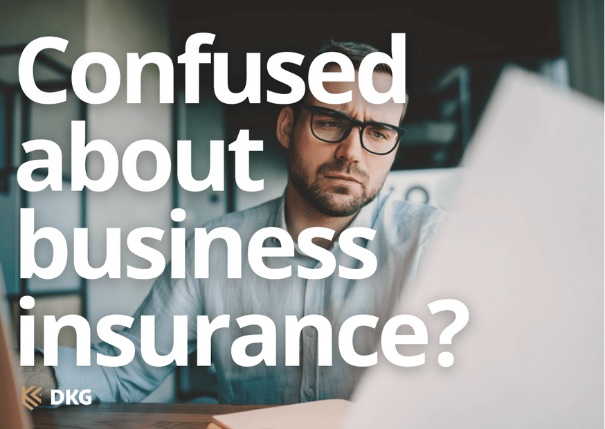 Image of a man frowning at his computer with the heading confused about business insurance
